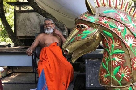 Laki Senanayake next to one of his sculptures at Diyabubula in August 2020 (courtesy of dailymirror.lk)