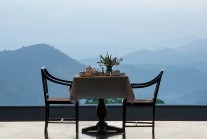 Quintessential Ceylon - a pot of tea overlooking misty mountains in the magnificent Hill Country at W15 Hanthana Estate, Kandy, Sri Lanka