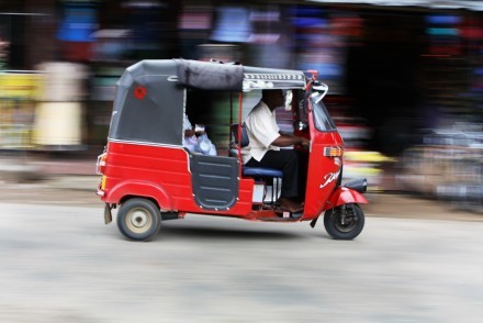 Tuk tuk speeding through the streets, Sri Lanka