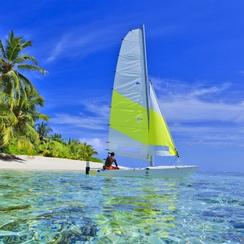 Catamaran sailing around the island, Maldives