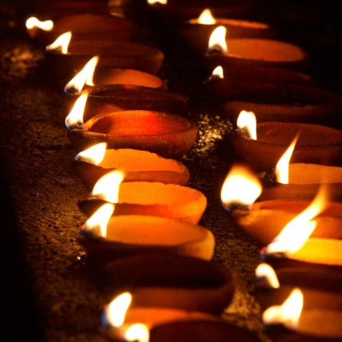 Votive candles at a temple in Sri Lanka